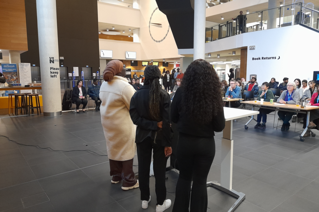 Team presenting in ground floor of Learning Hub