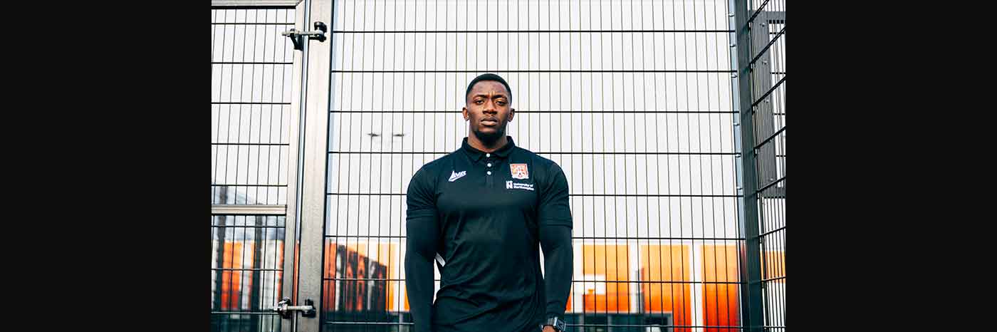 The photo shows Ashlee Adebayo, who graduated in Sport and Exercise Science BSc (Hons) from the University of Northampton in 2017