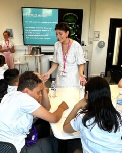 Sharon White and Imogen Booker, UON Third Year English Literature students explore the idea of monsters with Northampton primary school children.