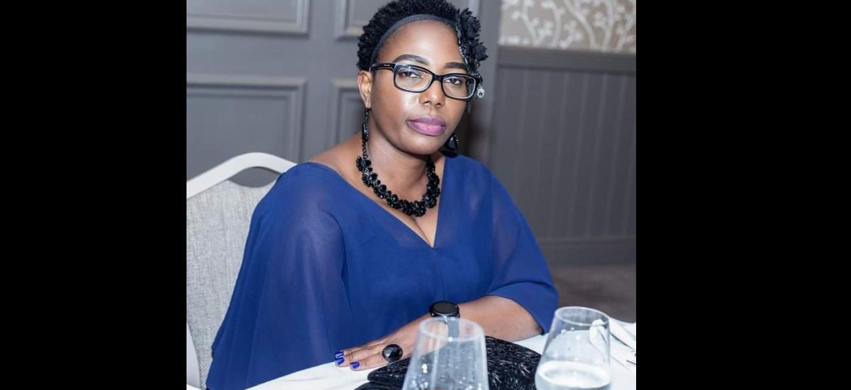 Image of Fiskani Kondowe sat at a table.